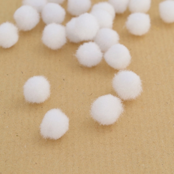 Petits pompons blancs 10 mm
