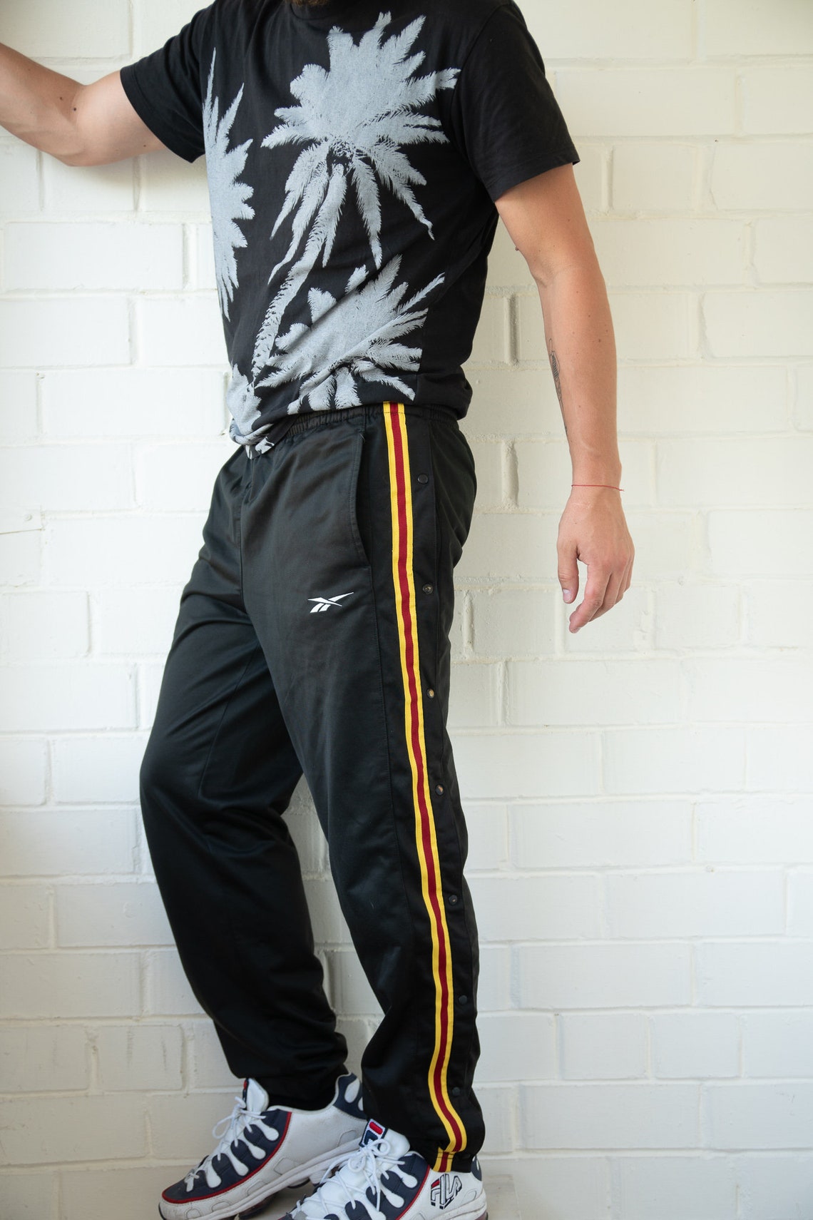 popper track pants