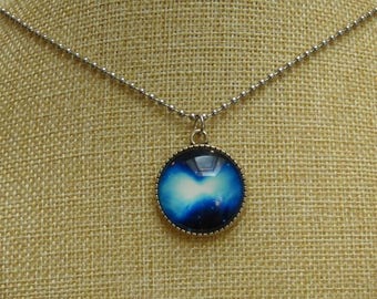 Sky blue cosmos cabochon necklace
