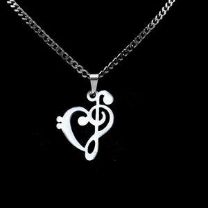 May include: A silver necklace with a heart-shaped pendant featuring a treble clef design.