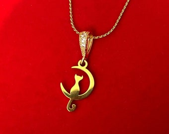 Little cat necklace sitting on a gold crescent moon, stainless steel, bail and chain of your choice