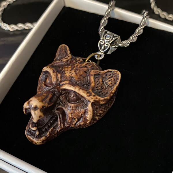 Vintage wolf head necklace showing the fangs, bail and chain of your choice