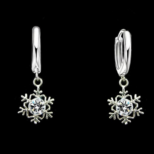 Boucles d'oreille flocon de glace d'argent au topaze diamant pour une reine des neiges