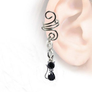 Earcuff espiral con gato de cristal sobre infinito plateado, cristal a elegir