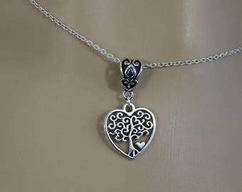 Necklace "Tree of life in heart under infinite mazes"