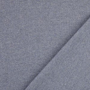 May include: Close-up of a textured, blue-grey fabric. The fabric is ribbed with vertical lines, and a diagonal section of the fabric is visible, showing a smoother texture. The material appears to be a knit or jersey.