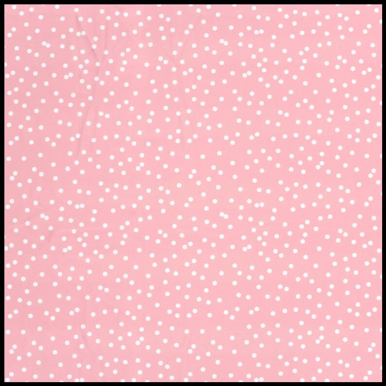 May include: Pink fabric with a white polka dot pattern.