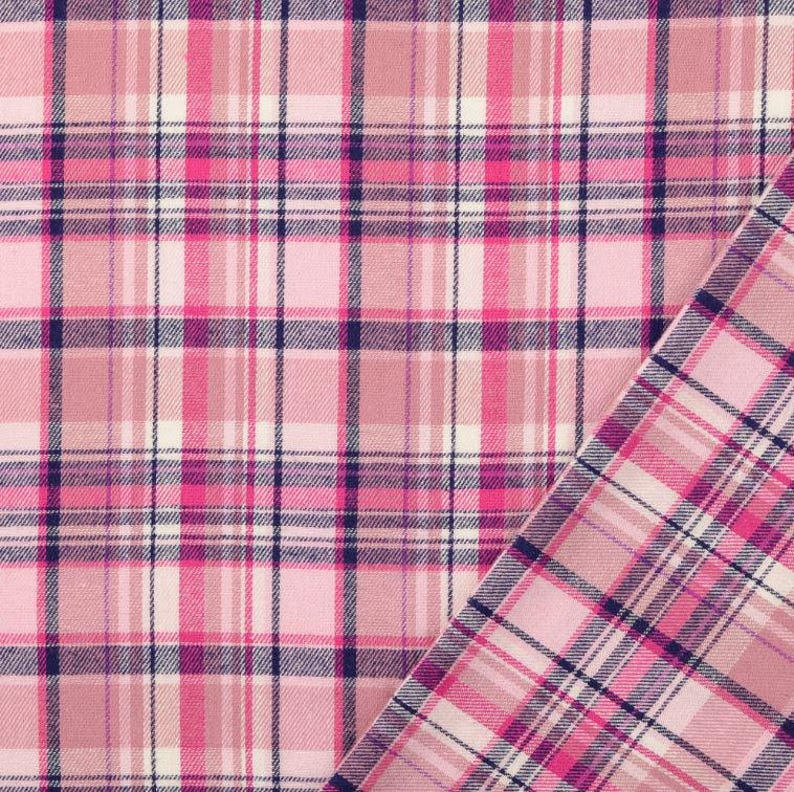May include: Pink plaid fabric with a diagonal section of the same pattern. The plaid design features a grid of pink, white, and navy blue lines. The fabric has a soft, textured appearance.