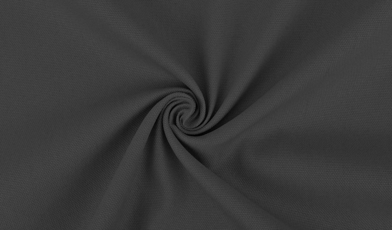 May include: A close-up of a dark gray fabric with a textured surface. The fabric is folded and twisted, creating a swirling pattern.