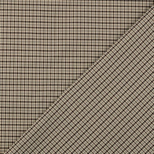 Könnte beinhalten: Nahaufnahme eines Stoffes mit braunem und weißem Karomuster. Der Stoff ist in der Mitte gefaltet, wobei die beiden Stoffseiten unterschiedliche Winkel des Musters zeigen.