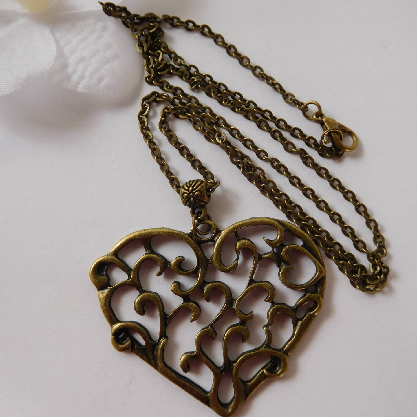 Bronzecoloured watermark heart necklace Etsy