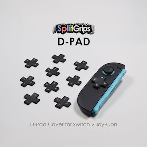 May include: A set of black cross-shaped D-pad covers for a game controller, featuring various colored directional arrows. The text SplitGrips D-PAD and D-Pad Cover for Switch 2 Joy-Con is visible above and below the controller components.