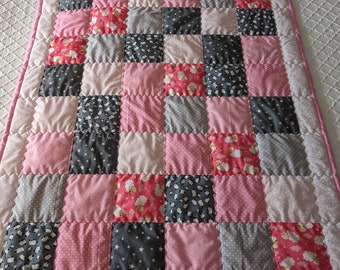 Hand made and hand finished patchwork lightweight cot quilt