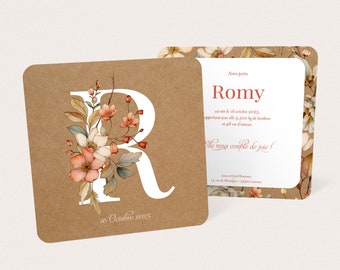 Birth announcement flowery letter on kraft background, with vintage wild flowers