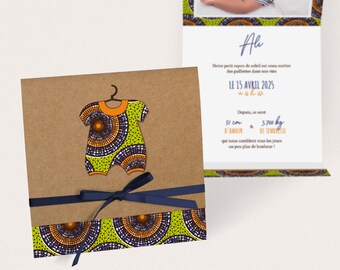 Birth announcement for boy in African wax romper on kraft background