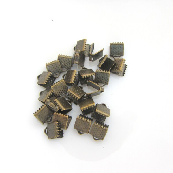 Lot de 10 embouts, pince griffe 0,6 mm, bronze, collier ruban