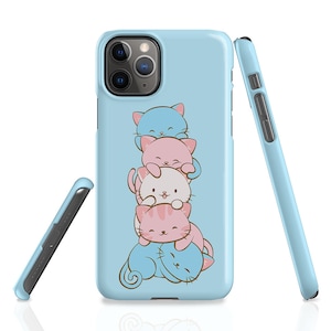 May include: A light blue phone case featuring a stack of five cartoon cats. The cats are in various colours and poses. The case has a camera cutout and a clear back.