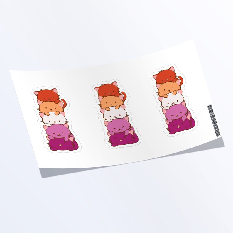 May include: Three sets of stickers featuring a stack of five cartoon cats in the colors of the lesbian pride flag. The cats are stacked on top of each other, with the red cat on top and the purple cat on the bottom.