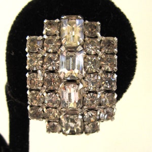 Circa 1950s Kramer Curved Rhinestone Sparkling Clip Back Earrings