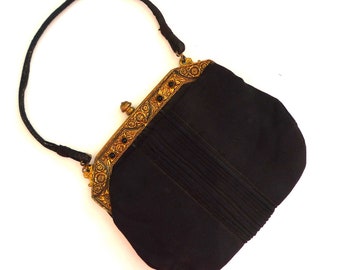 black fabric handbags