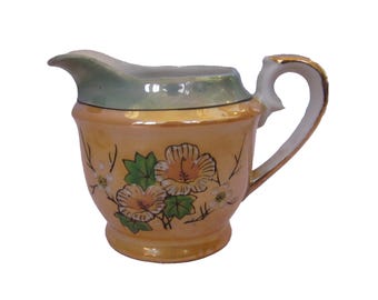 Japans lusterware perzik en bloemen creamer gemarkeerd als buitenlands