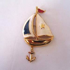 Circa 1970s Avon Gold Tone and Enamel Patriotic Sailboat Brooch/Pin