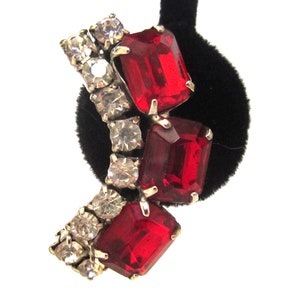 Circa 1950s Red and Clear Rhinestone Curved Clip Earrings