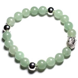 May include: A green jade stone bracelet with silver beads and a silver Buddha charm.