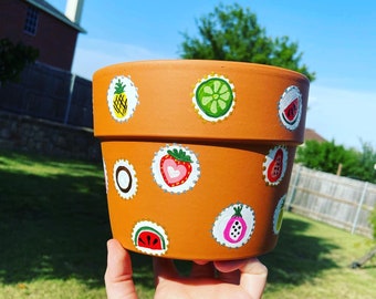 Fruitsticker stijl bloempot
