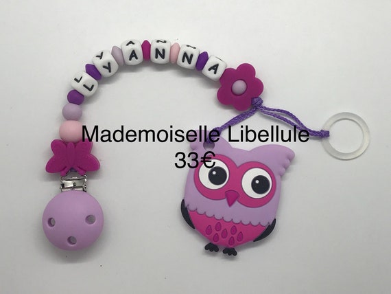 Personalised box including a lollipop attachment and a dentition bracelet in a decorated box