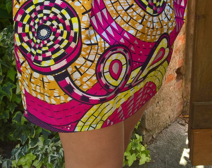 Low-waisted tulip-shaped wax mini skirt