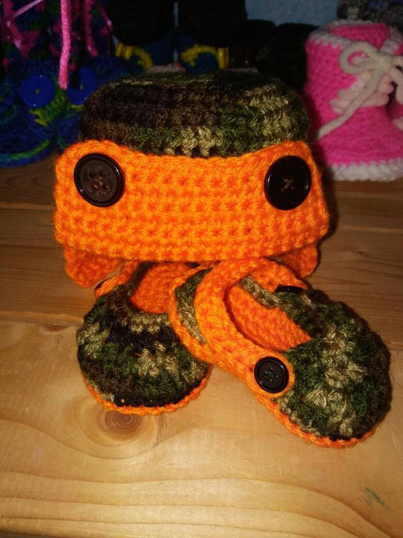 camo crocs with orange sole