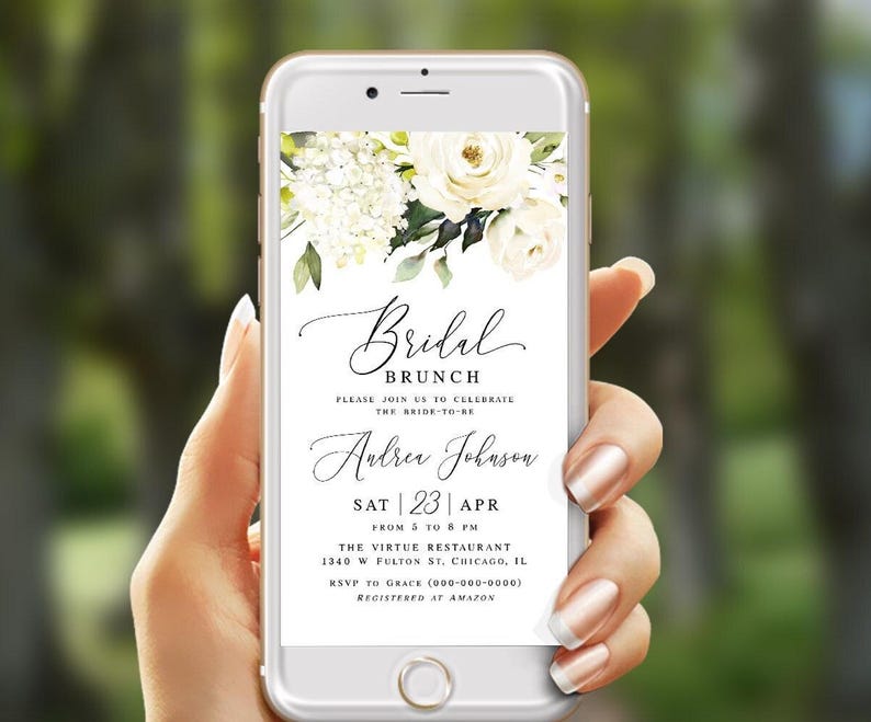 Pode incluir: Uma maquete de tela de telefone com um design floral branco e verde com um convite para um brunch de casamento. O convite diz "Bridal Brunch", "Please join us to celebrate the bride-to-be", "Andrea Johnson", "Sat | 23 | Apr", "From 5 to 8 PM", "The Virtue Restaurant", "1340 W Fulton St, Chicago, IL", "RSVP to Grace (000-000-0000)" e "Registered at Amazon".