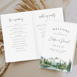 Op de afbeelding: Huwelijksceremonieprogramma met een aquarelillustratie van een bergmeer en een bos. Het programma geeft de volgorde van de gebeurtenissen voor de ceremonie en de bruiloft aan. De tekst luidt "Welkom op de bruiloft van Elisha & Daniel 09.23.27 Manor Vail Lodge Vail, Colorado."
