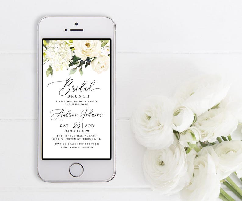 Pode incluir: Uma tela de smartphone branca exibindo um convite para um brunch de casamento com um design floral. O convite inclui o texto "Bridal Brunch", "Please join us to celebrate the bride-to-be", "Audrey Johnson", "Sat | 23 | Apr", "From 5 to 8 PM", "The Virtue Restaurant", "1340 W Fulton St. Chicago, IL", "RSVP to Grace (000-000-0000)" e "Registered at Amazon".
