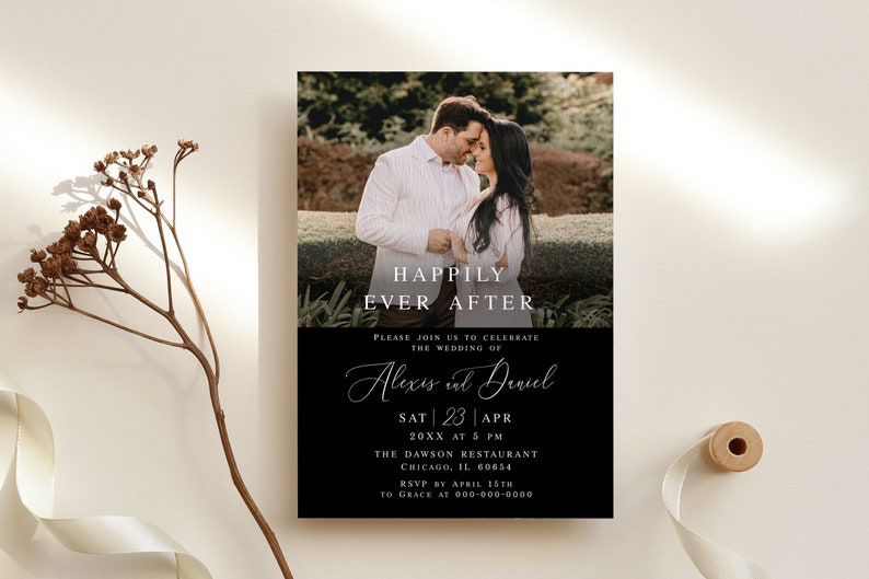 May include: Black and white wedding invitation with a photo of a couple embracing. The invitation reads "Happily Ever After" and includes the couple's names, wedding date, time, location, and RSVP information.
