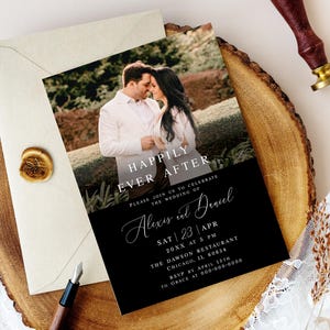 May include: Black and white wedding invitation with a photo of a couple in a garden setting. The text reads "Happily Ever After" and "Please join us to celebrate the wedding of Alexis and Daniel". The date, time, and location of the wedding are also included.