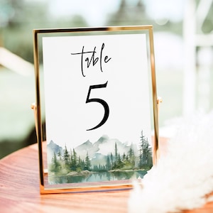 Modelo de cartão de número de mesa de montanhas Cartão de número de mesa para impressão Cartão de mesa de casamento de floresta de lago Moderno Baixar Editar com Templett MOLAFF7