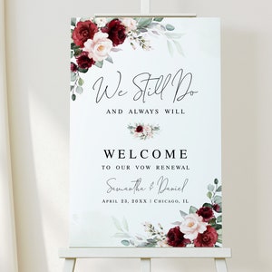 Może przedstawiać: Biały znak z burgundowymi i różowymi ilustracjami kwiatowymi. Tekst brzmi "We Still Do and Always Will. Welcome to our Vow Renewal Samantha & Daniel April 23, 20XX Chicago, IL"