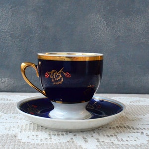 Set of porcelain cup and saucer Cobalt blue tea coffee cup Espresso cappuccino cup Table serving farmhouse kitchen Rustic table top