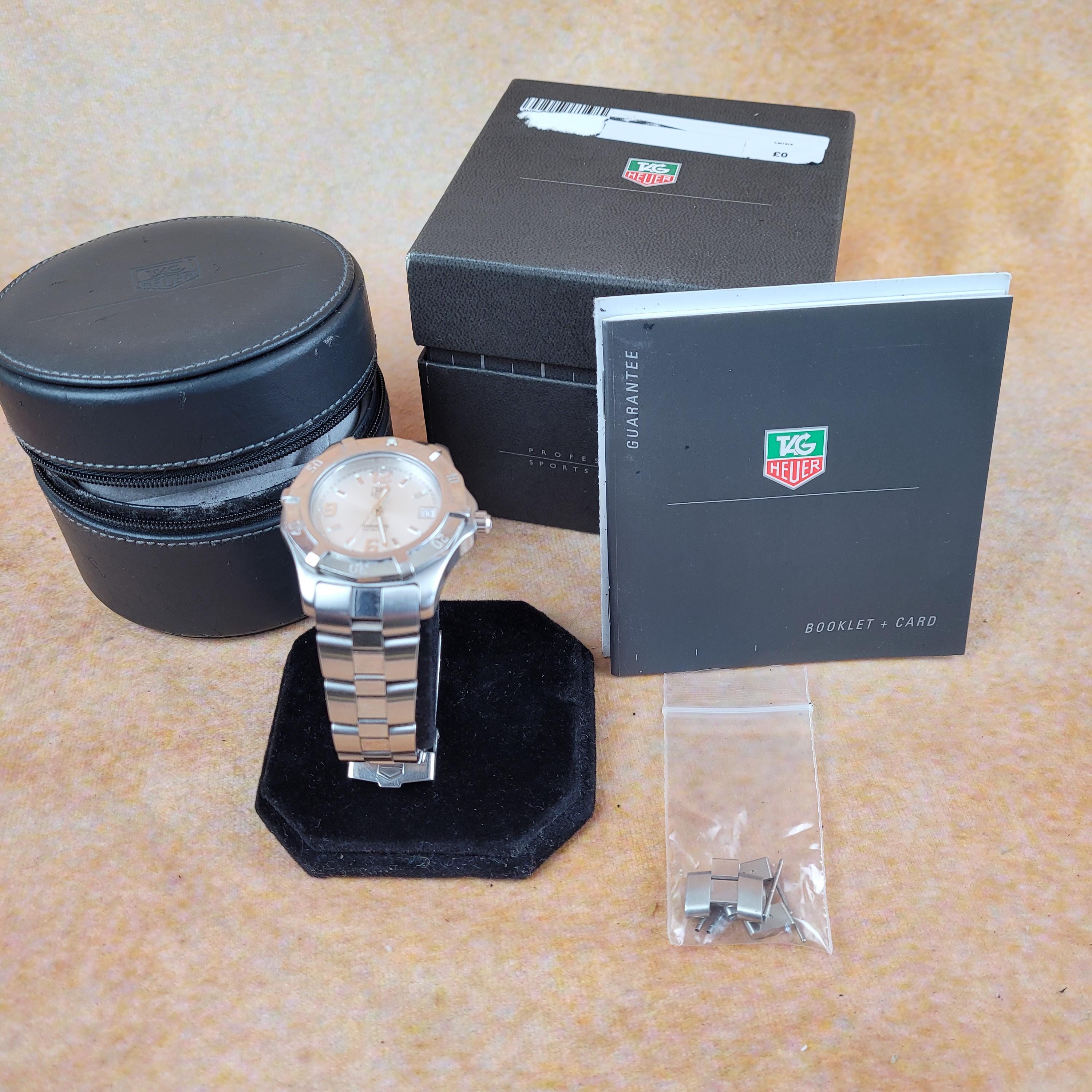 Tag Heuer Exclusive Automatic 200 Professional, with instuctions, boxes and guarantee card.