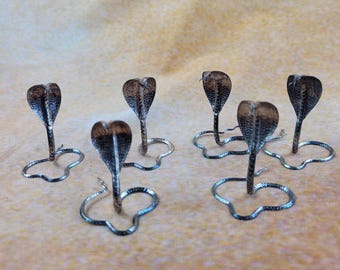 Matching set of 6 silver cobra snake menu holders.
