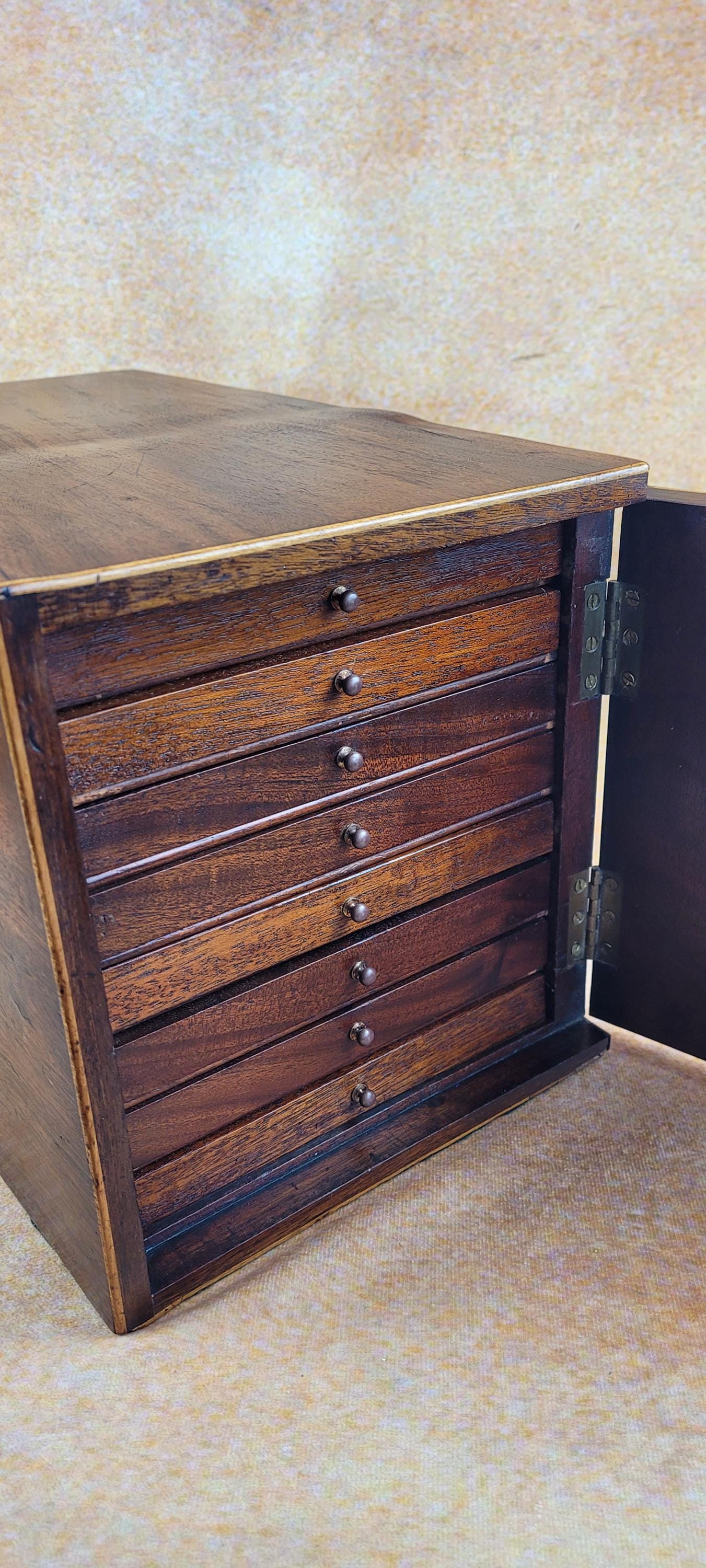 Antique Victorian table top specimen or display cabinet. Circa 1850 - 1900. 8 drawers.