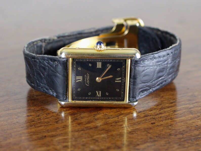 gold cartier tank watch price