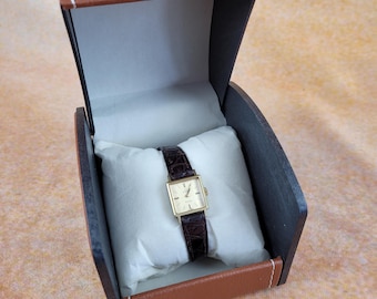 Ladies vintage Omega Geneve wrist watch gold plate, square shape, dated to 1969