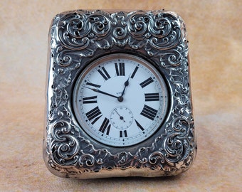Reloj de bolsillo antiguo Goliat. Fabricado en Suiza en caja original de plata de ley repujada con sello inglés.