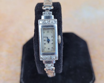 Ladies Platinum and Diamond vintage cocktail watch. Working. Circa 1930
