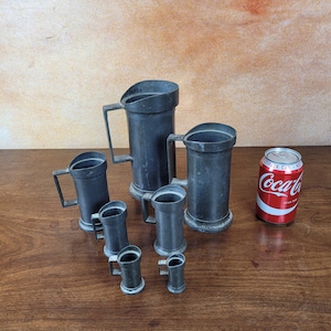 7 antique Pewter Jugs