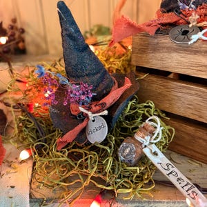 A primitive Halloween witches hat ornament