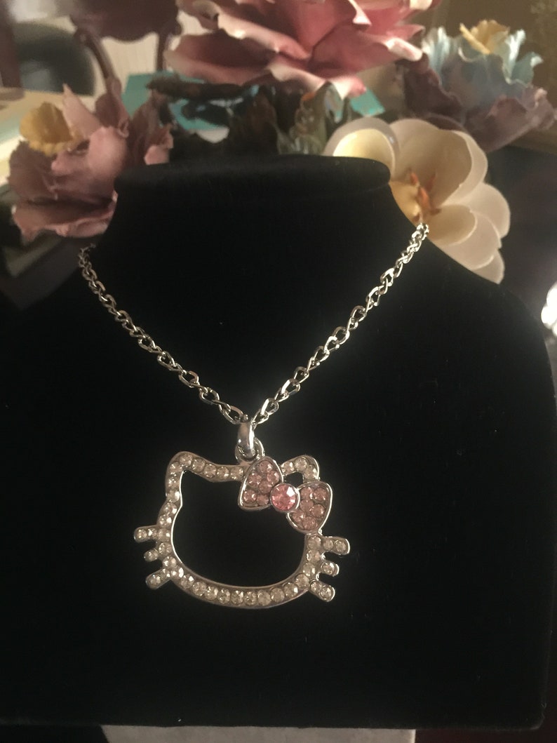 Hello Kitty Face Necklace Pendant Charm With a Pink Bow Paved Cubic ...